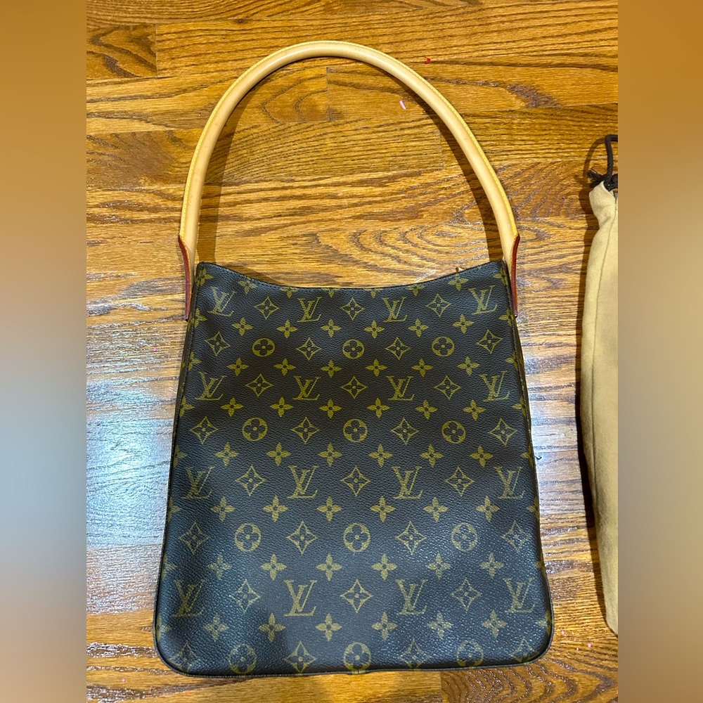 Authentic NWT Louis Vuitton Looping Monogram M51145 never used